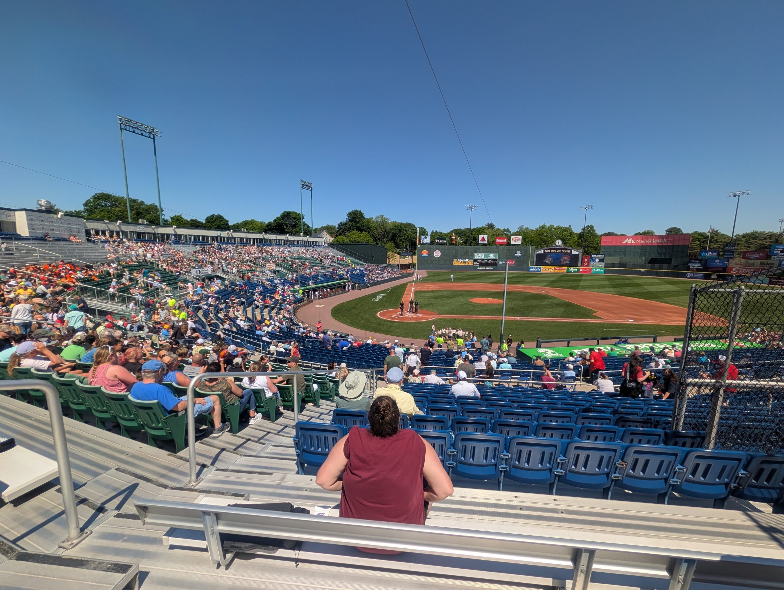 Hadlock Field — the Portland Sea Dogs game in progress under a hot blue sky