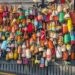 A wall of colorful Maine lobster buoys in Boothbay Harbor