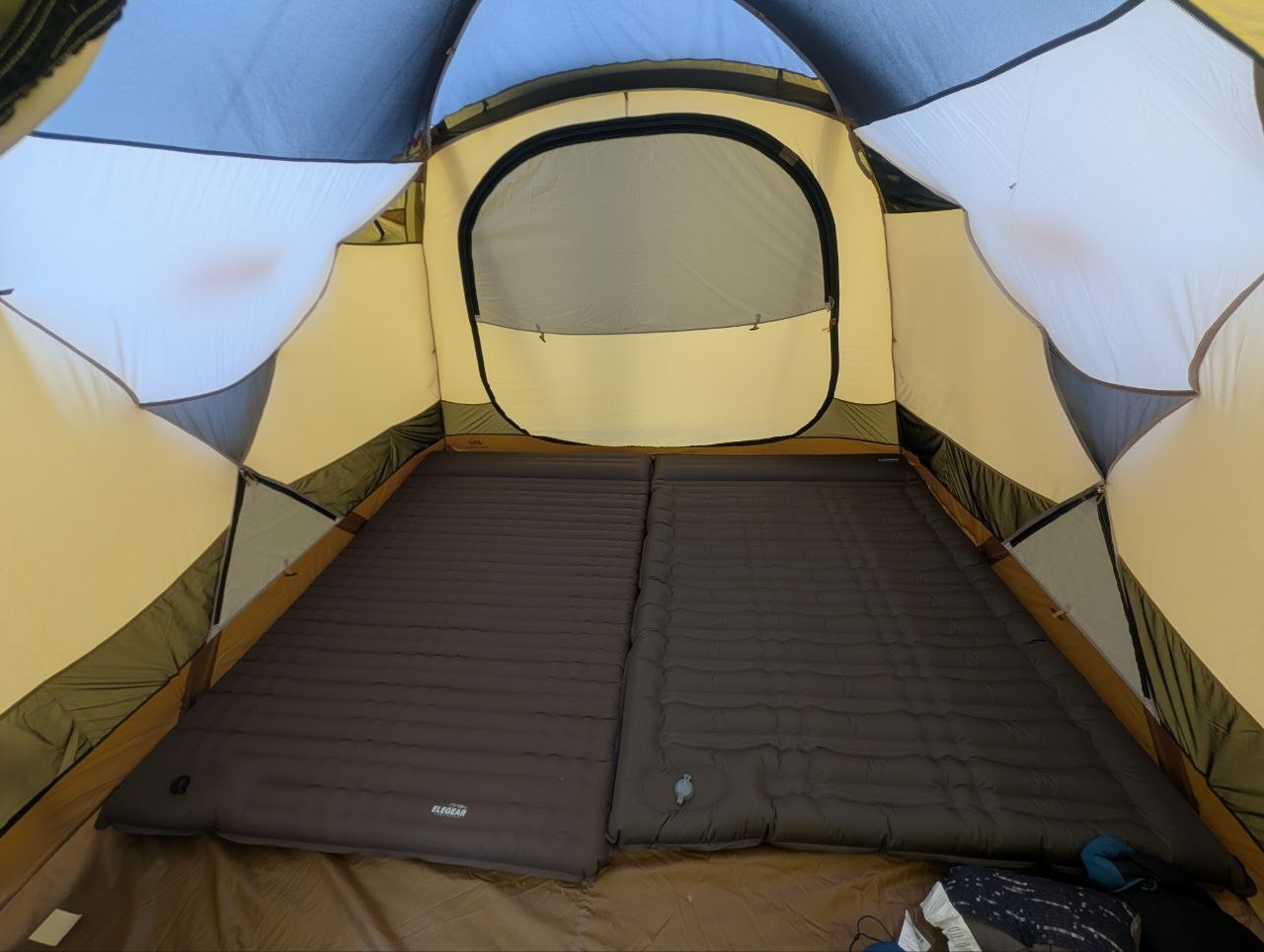 Inside the tent at Blackwoods — sleeping pads laid out, settled in for a rainy first night