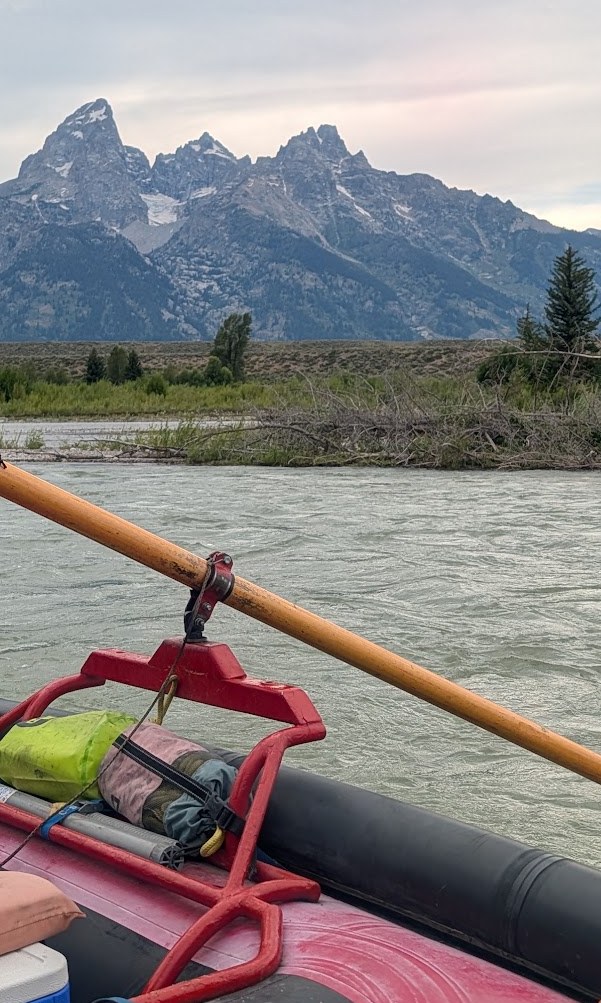 The oar, the raft frame and dry bags, with the Grand Teton across the river