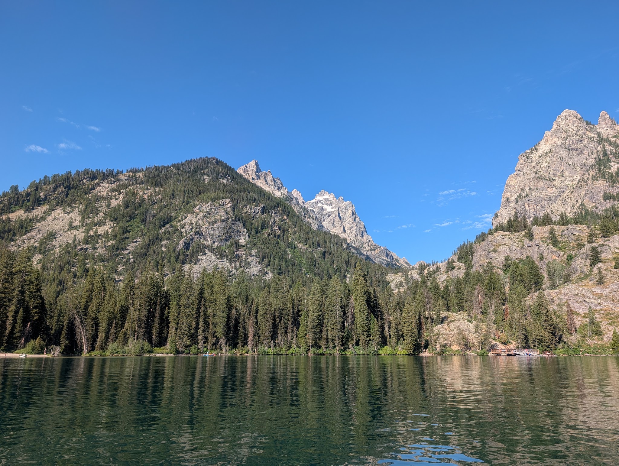 The west end of Jenny Lake, peaks rising from the water